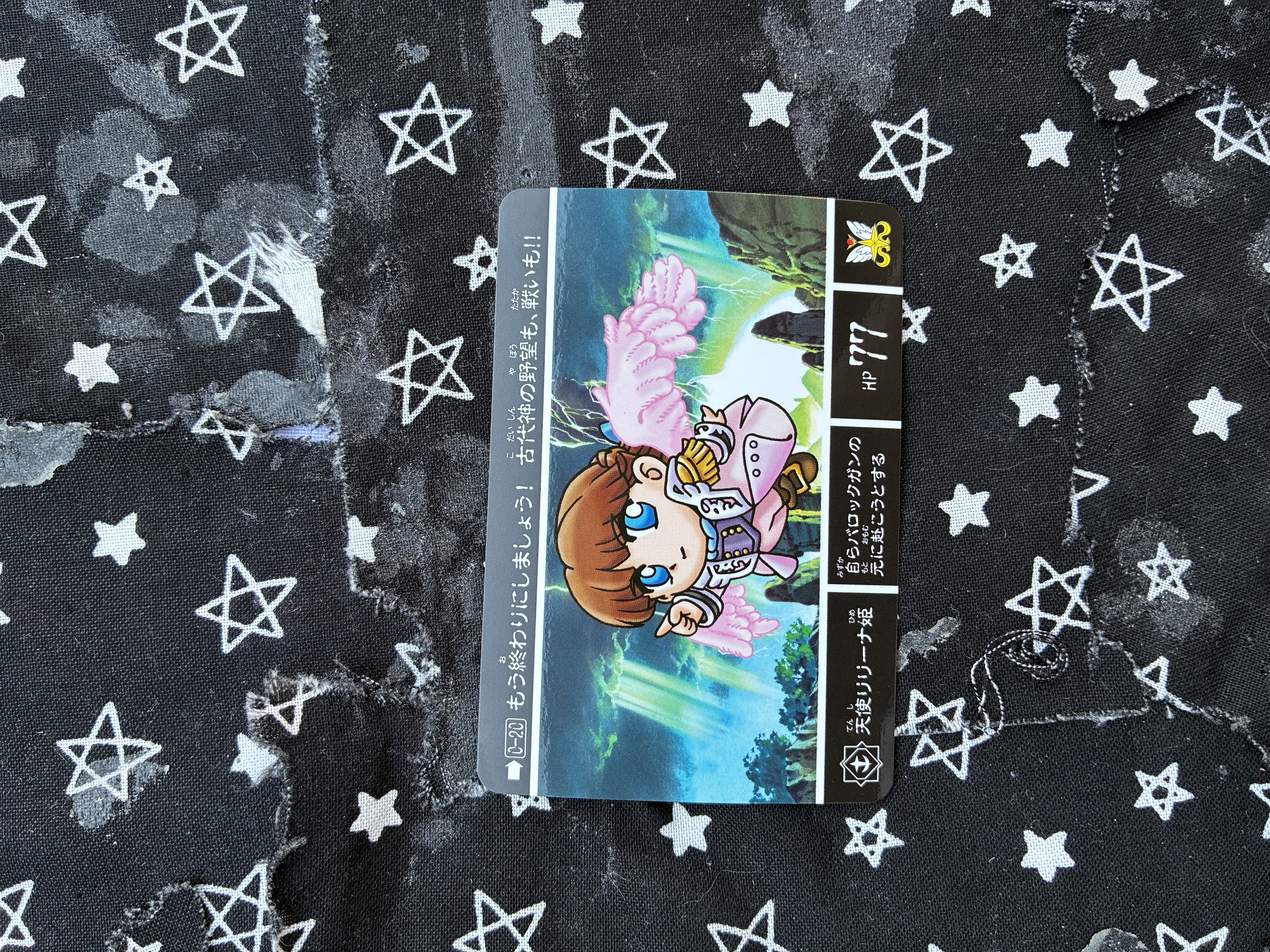 A Bandai SD Gundam Gaiden Carddass collectible trading card featuring Relena in her Sanc Kingdom uniform flying in the air with her angel wing.